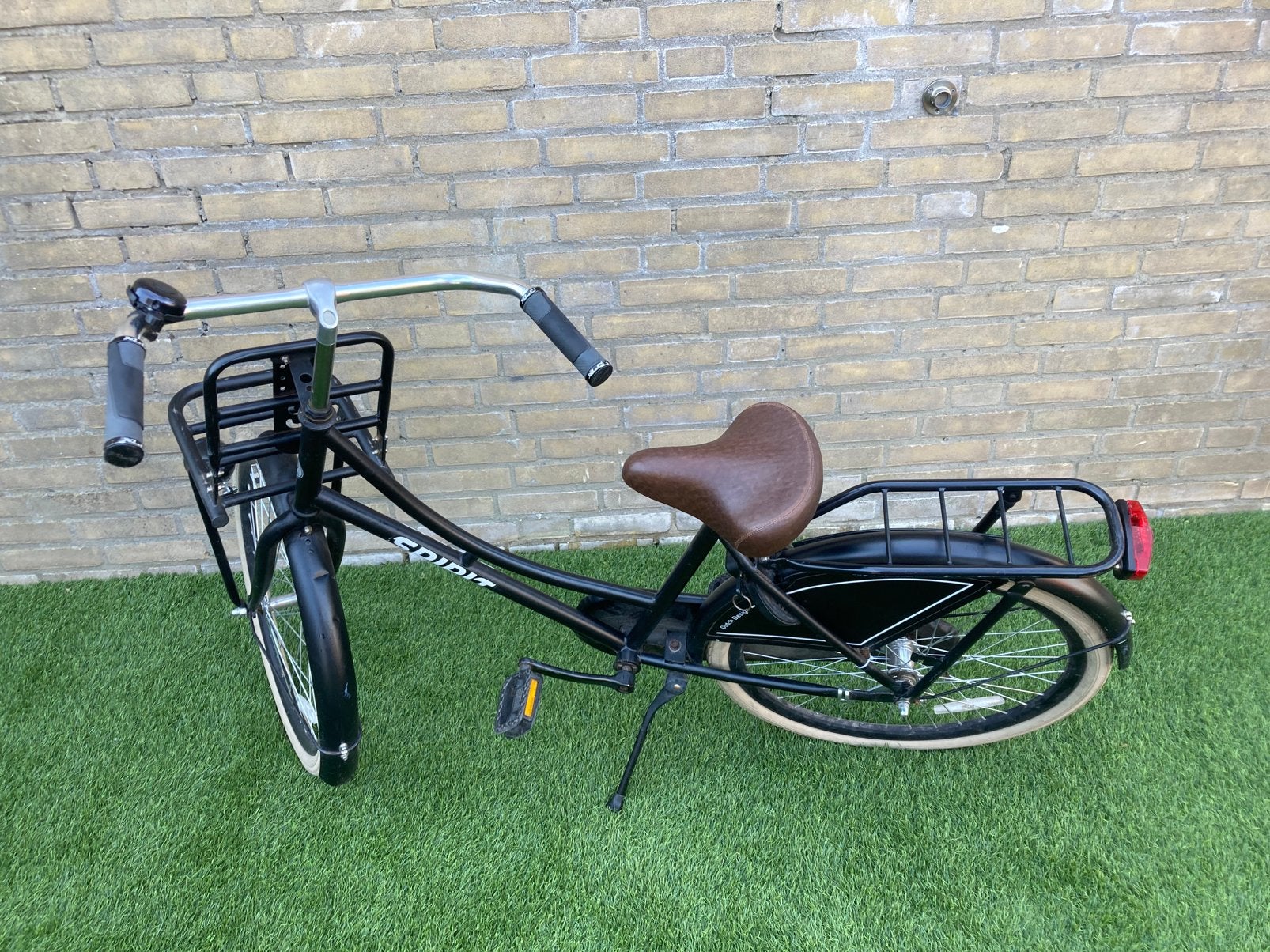 Zwarte 24 inch SPIRIT DUTCH DESIGN fiets, Ophalen, Gebruikt, Terugtraprem, 20 inch of meer