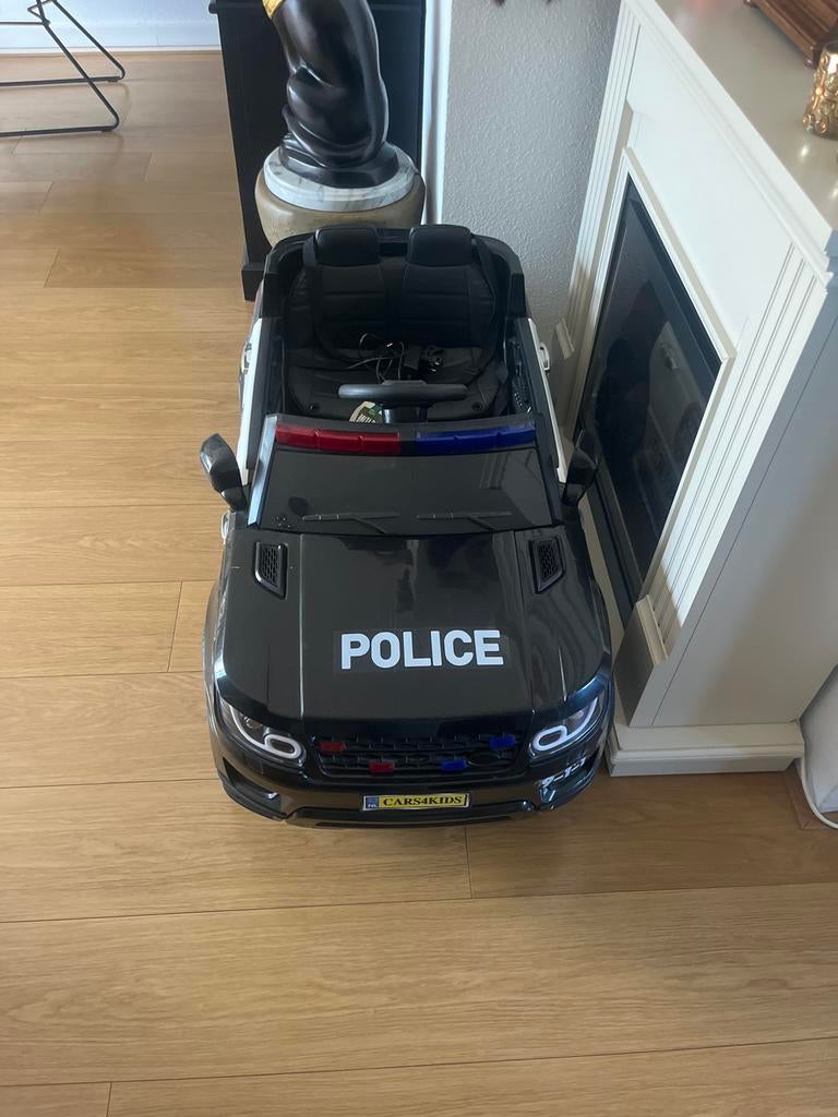 Elektrische Politie Kinderaccu Auto met Megafoon en Zwaailic, Ophalen of Verzenden, Zo goed als nieuw
