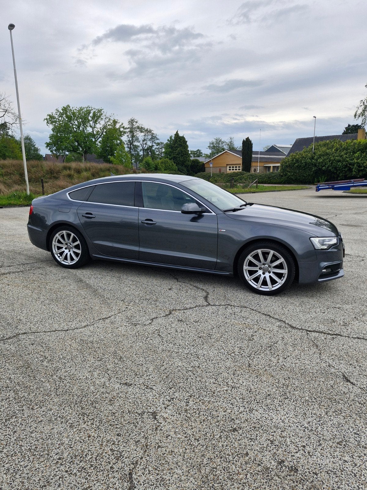 Audi A5 2.0 Tfsi S-line 165KW Sportback 2014 Grijs sportief, Voorwielaandrijving, Start-stop-systeem, Zwart, 4 cilinders