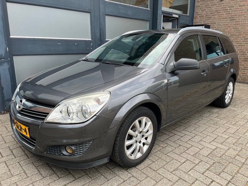 Opel Astra Wagon 1.6 Executive, 1ste eigenaar! Volledig onde, Auto's, Opel, Voorwielaandrijving, 15 km/l, Gebruikt, Zwart