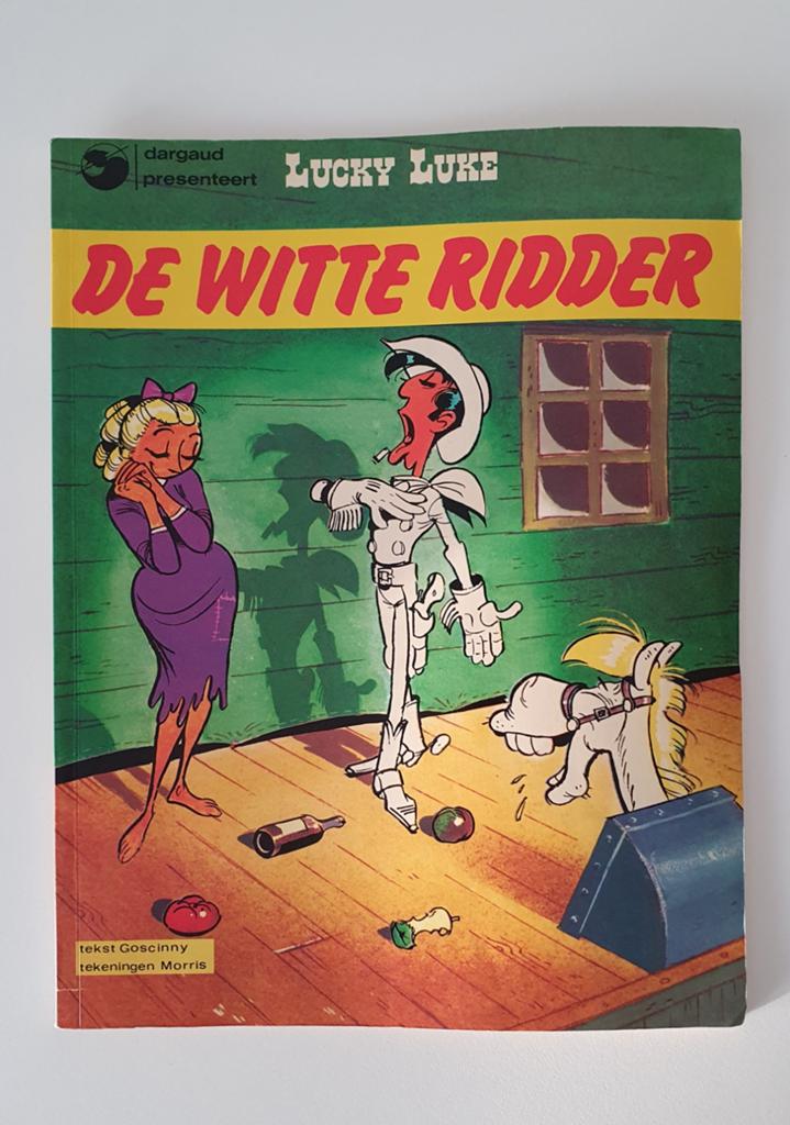 Lucky Luke De Witte Ridder 1e druk 1976, Boeken, Eén stripboek, Ophalen of Verzenden, Gelezen