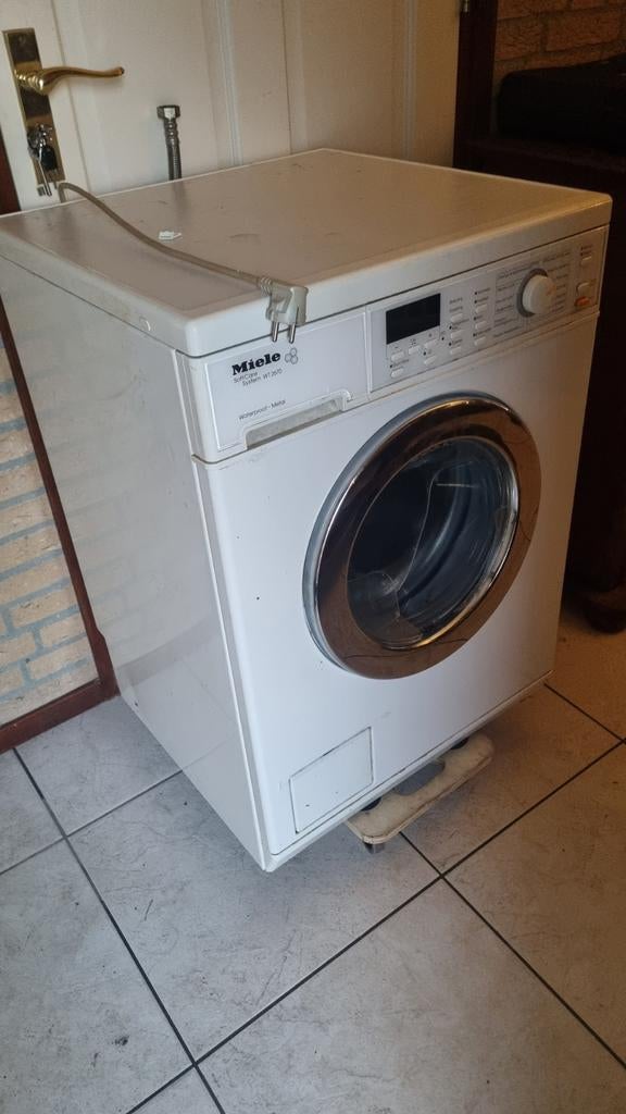 Defecte Miele wasmachine/droger combi WT2670, Witgoed en Apparatuur, Wasmachines, Ophalen of Verzenden, Voorlader, Niet werkend