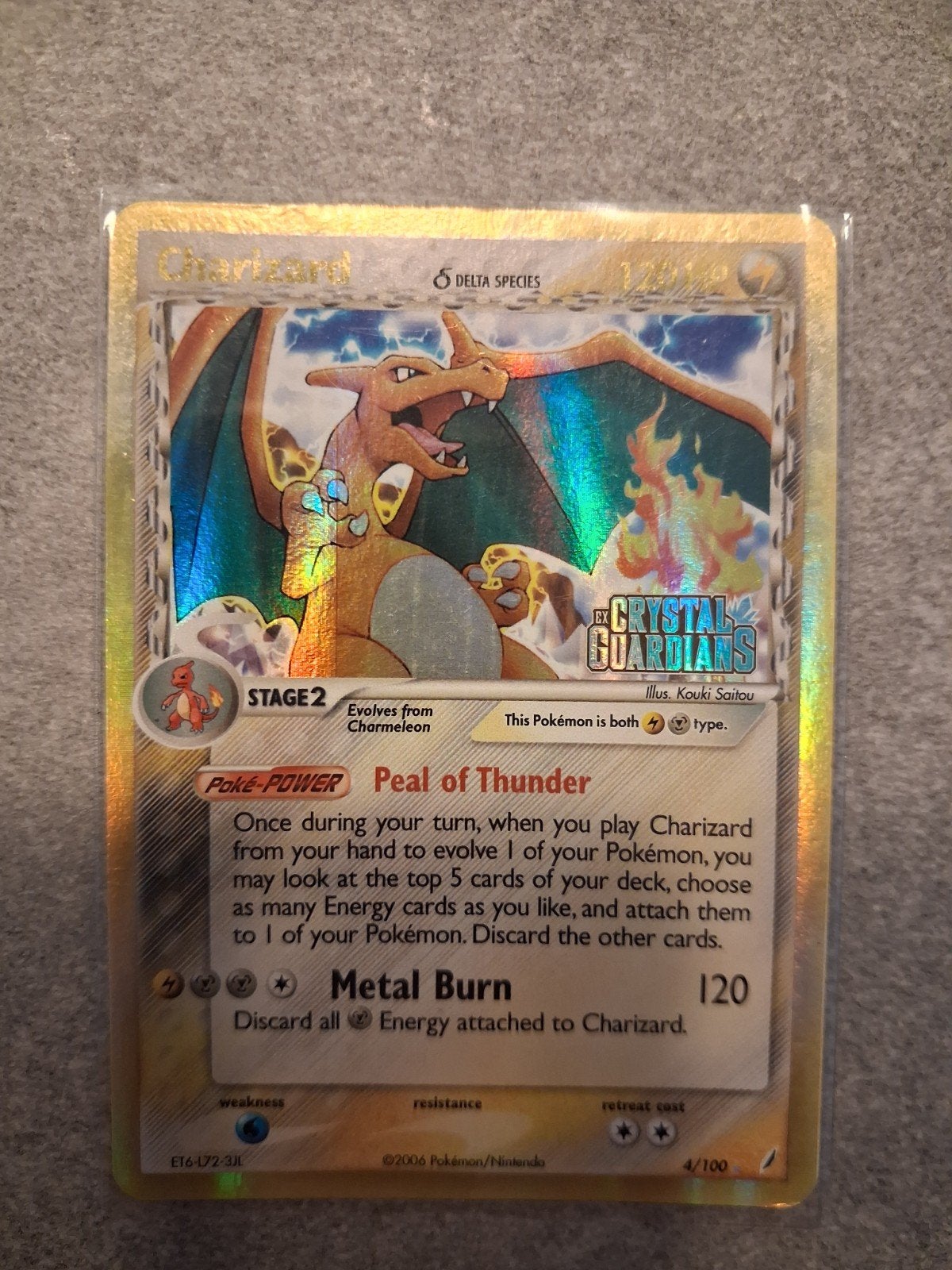 Charizard Delta Species Holo 4/100 stamped Crystal Guardians, Ophalen of Verzenden, Gebruikt, Losse kaart, Foil