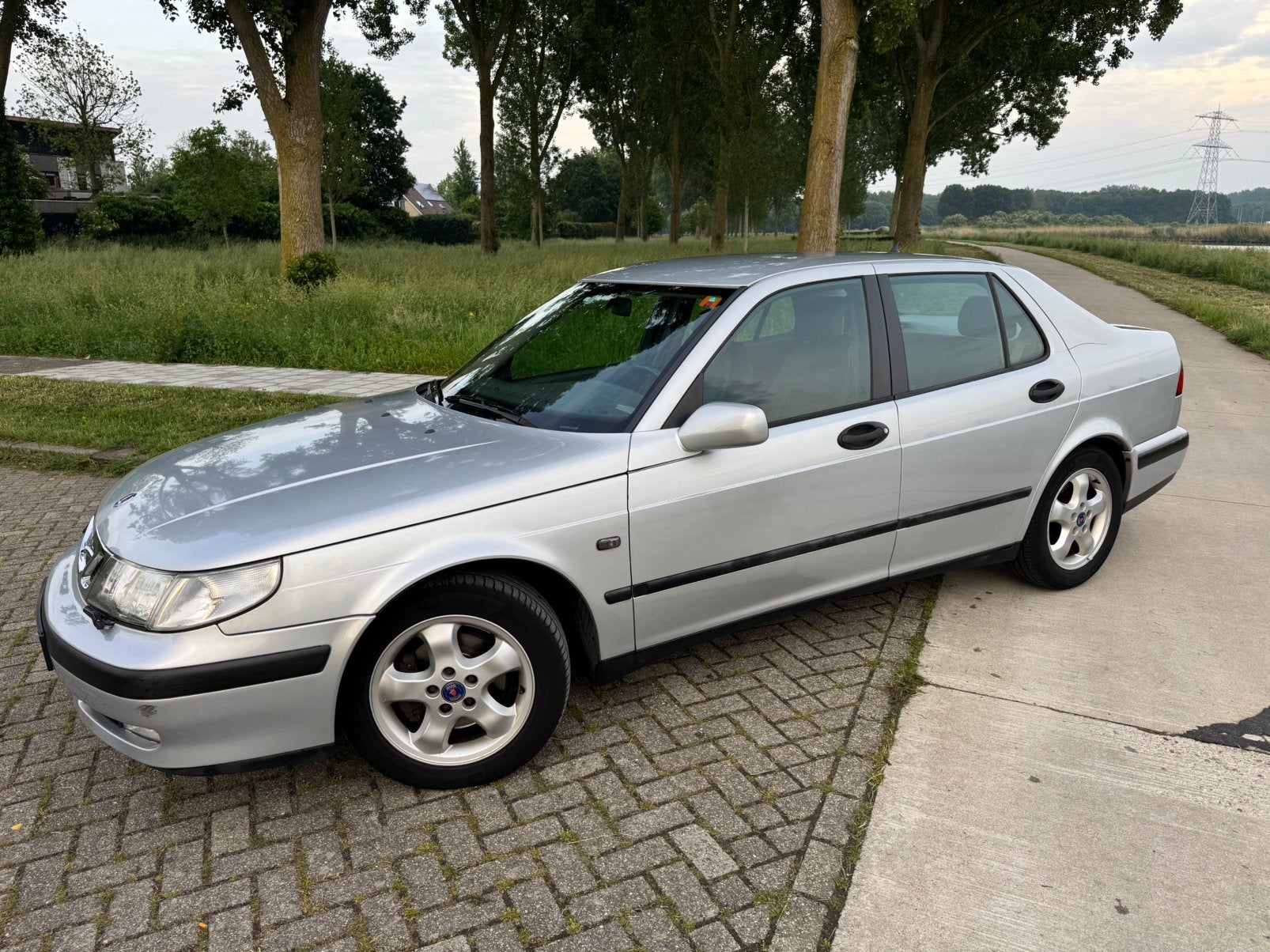 Saab 9-5 2.3t Automaat | APK 2027 | Cruise | 2 sets wielen, Auto's, Saab, Zwart, 2290 cc, Leder, Particulier