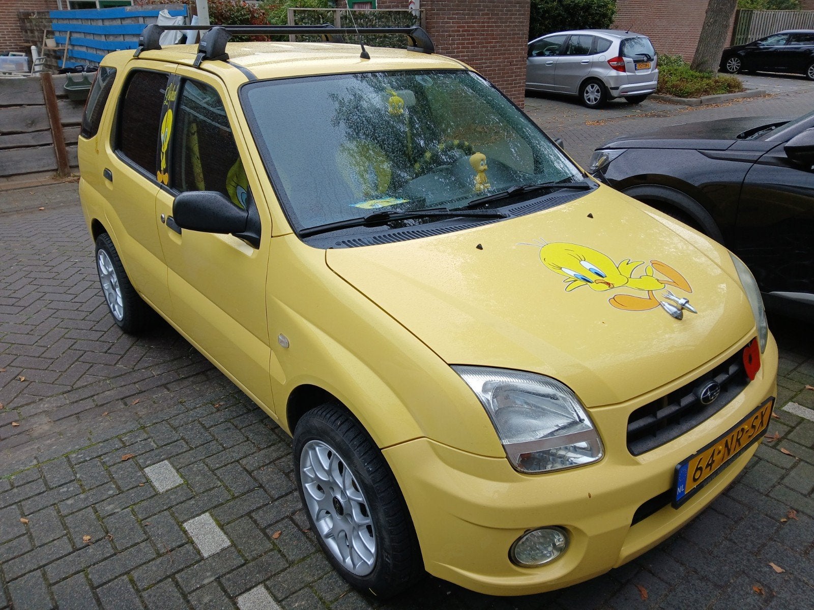 TWEETY 79.662 KM NAP  Subaru Justy 1.3 G3X 4x4 2004 TWEETY, Auto's, Verwarmde buitenspiegels, Justy, Zwart, Handgeschakeld