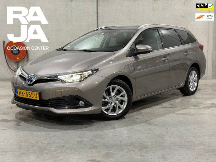 Toyota Auris Touring Sports 1.8 Hybrid Lease NAP CarPlay Cli, Auto's, Toyota, Gebruikt, Euro 6, Bruin, Origineel Nederlands