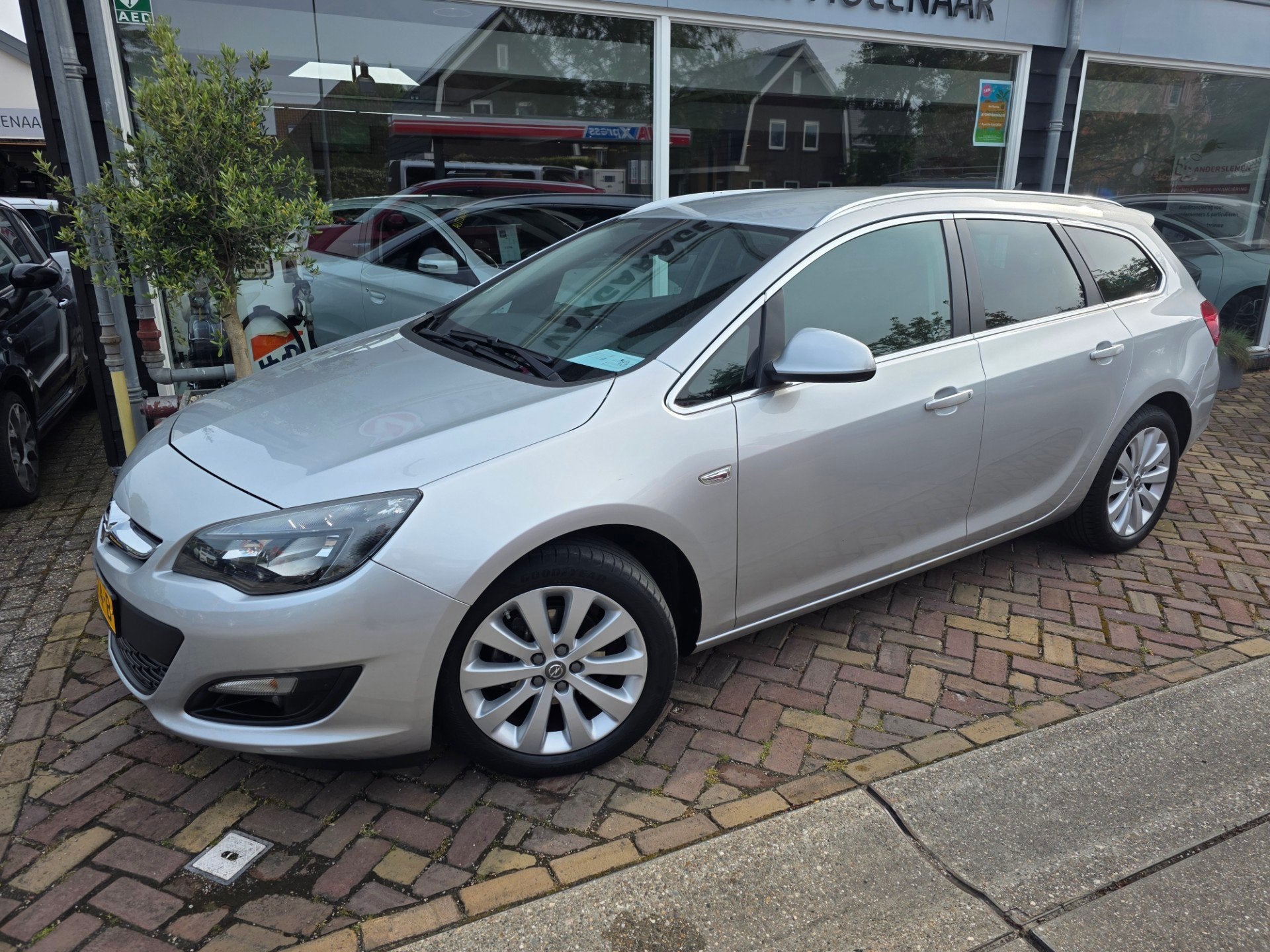 Opel Astra Sports Tourer 1.4 Turbo Blitz, Auto's, Gebruikt, Euro 6, 4 cilinders, Origineel Nederlands
