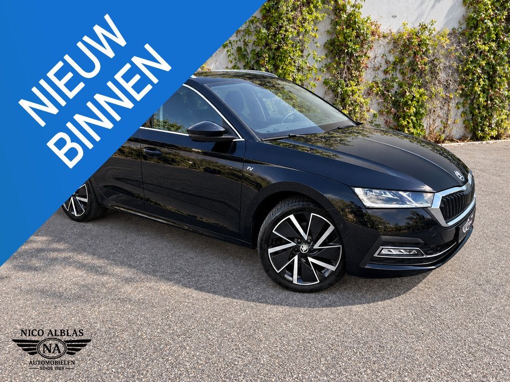 Skoda Octavia Combi 1.4 TSI iV PHEV Business Edition Plus, Auto's, Dealer onderhouden, Gebruikt, Zwart, Plug-in hybride