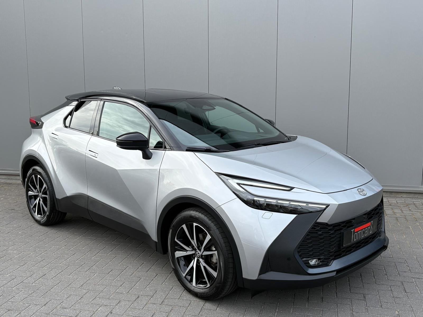Toyota C-HR 1.8 Hybrid 140PK First Edition Bi-Tone/Winter-pa, Auto's, 12 maanden, 4 cilinders, Bedrijf, Hybride Elektrisch/Benzine