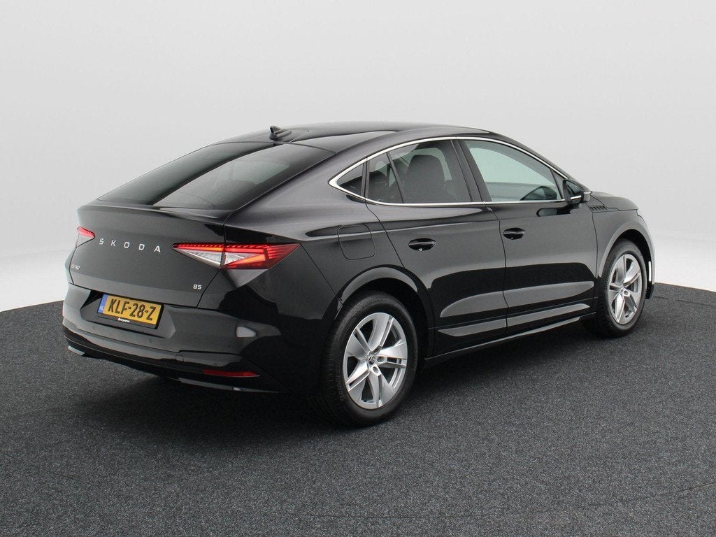 Skoda Enyaq Coupé 85 Business Edition 285 Pk | Stoel/Stuurv, Auto's, Skoda, Automaat, Achterwielaandrijving, Leder en Stof, Zwart