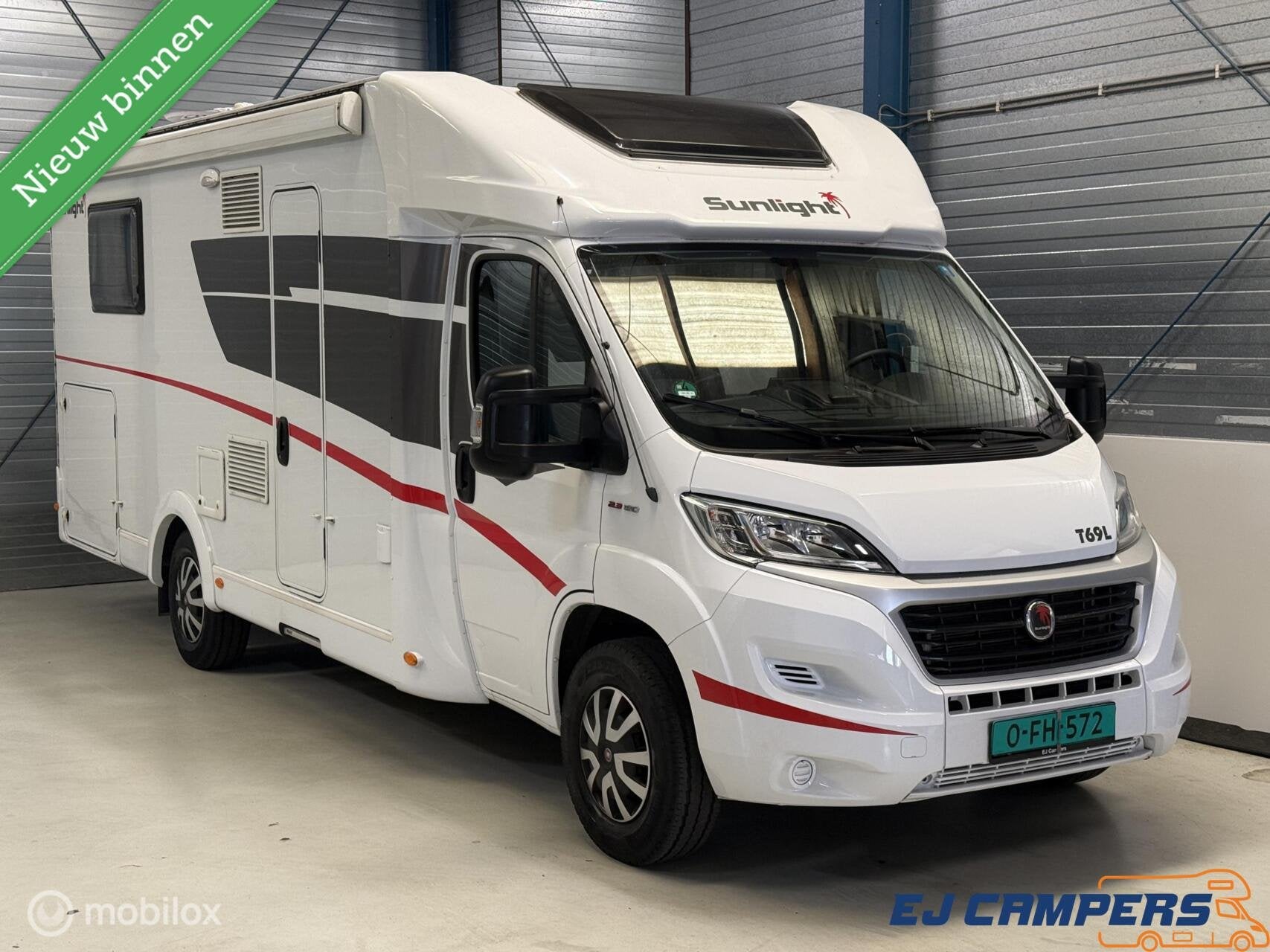 Sunlight T69 L Queensbed + Hefbed! EURO6!, Caravans en Kamperen, Sunlight, Ringverwarming, Airbags, 7 tot 8 meter