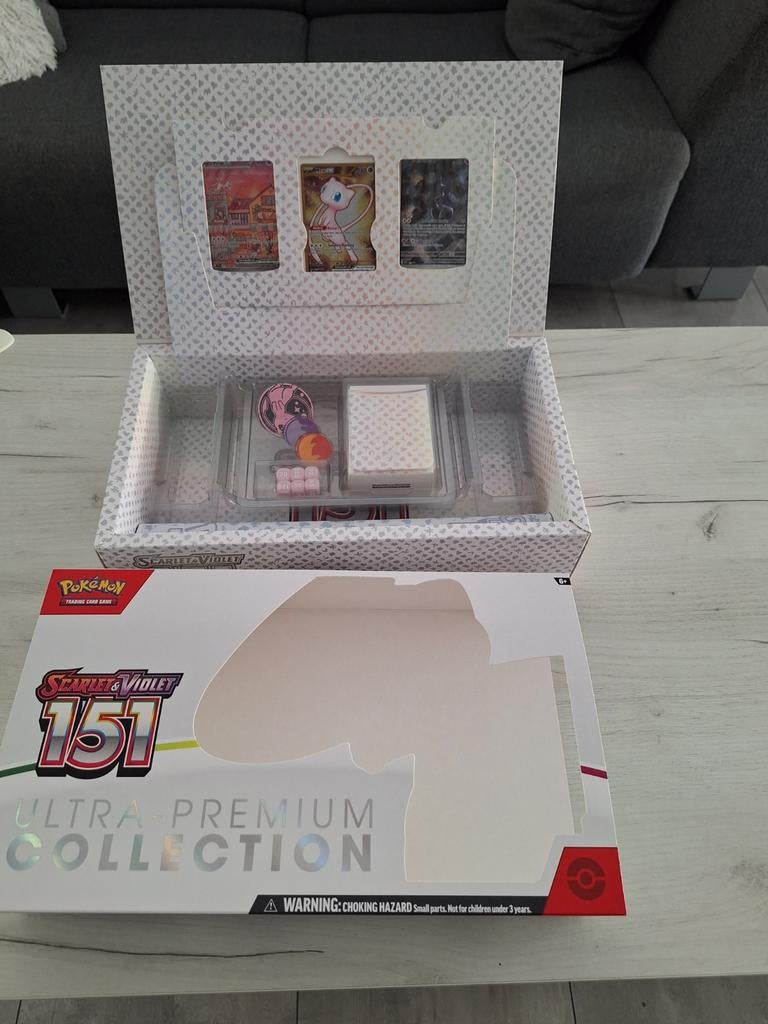 Pokemon 151 UPC (geopend), Ophalen of Verzenden, Zo goed als nieuw, Meerdere kaarten, Foil