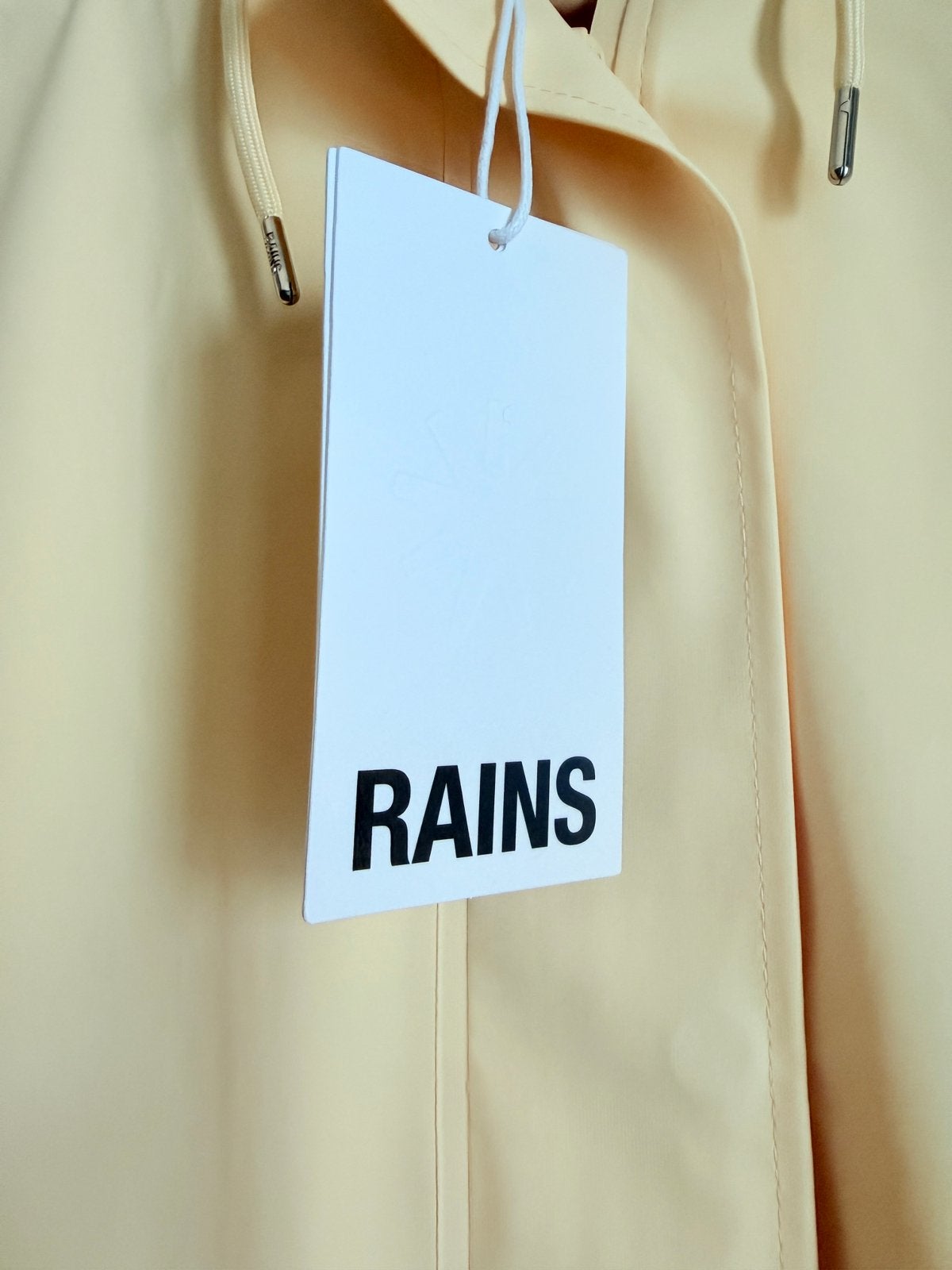 RAINS regenjas lichtgeel - nieuwe collectie, Ophalen, Zo goed als nieuw, Maat 36 (S)