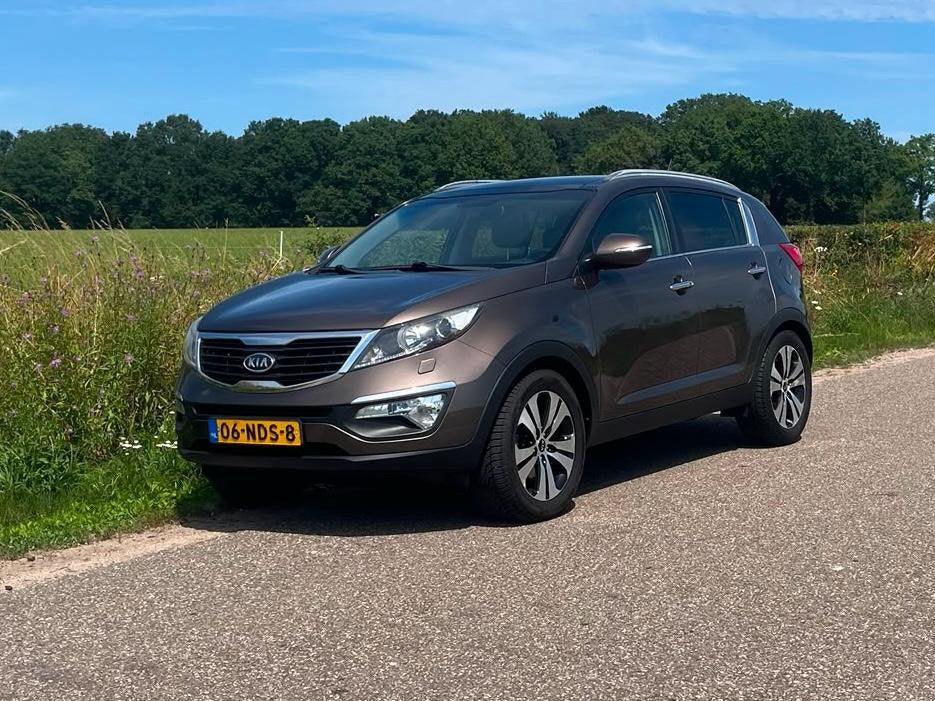 Kia Sportage 2.0 Cvvt 2WD AUT 2010 Bruin, Auto's, Kia, Particulier, Sportage, ABS, Achteruitrijcamera, Airbags, Airconditioning