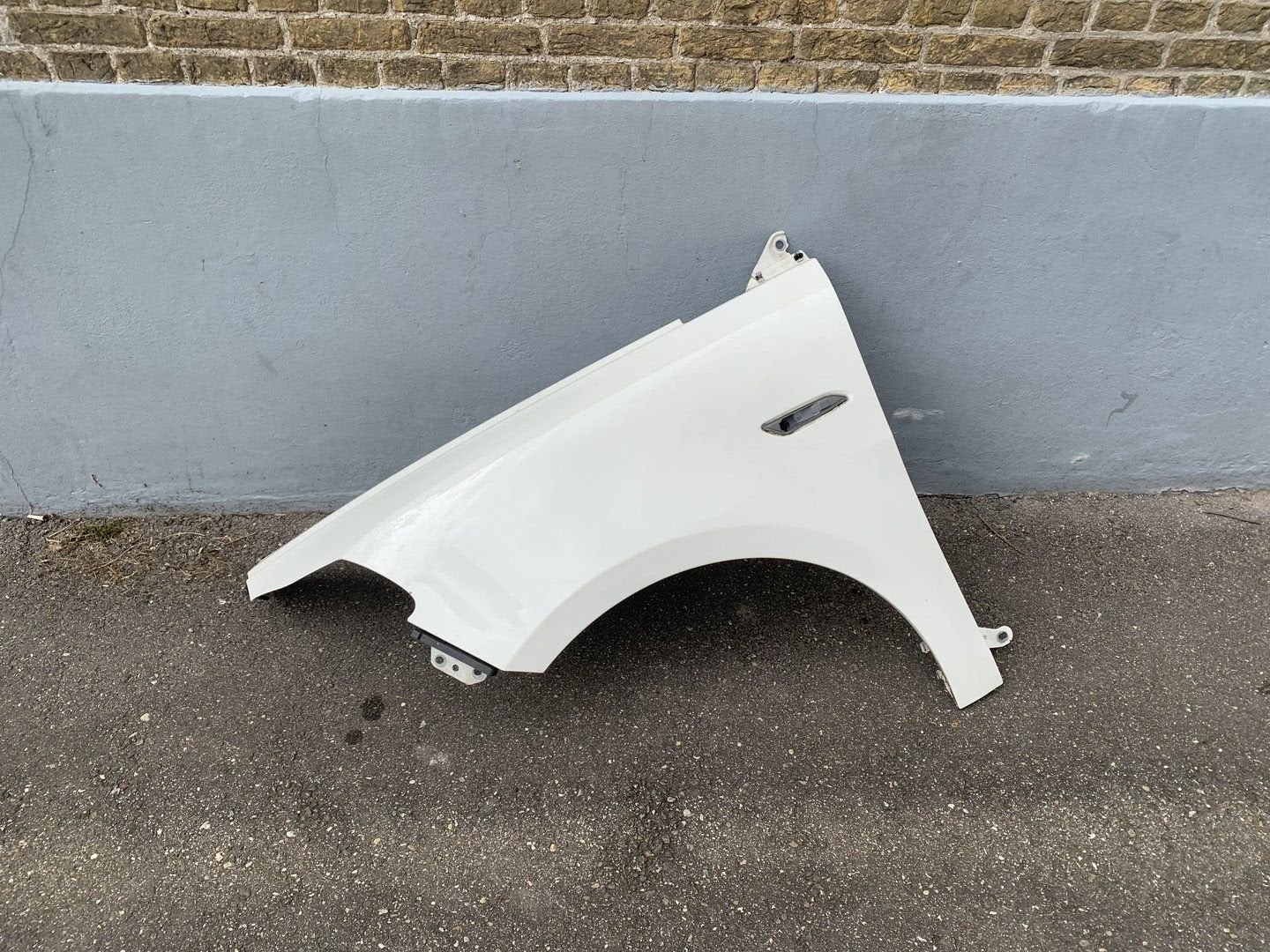 zijscherm / spatbord links lancia Ypsilon 2011 tot 2014 wit, Gebruikt, -, -, Ophalen of Verzenden