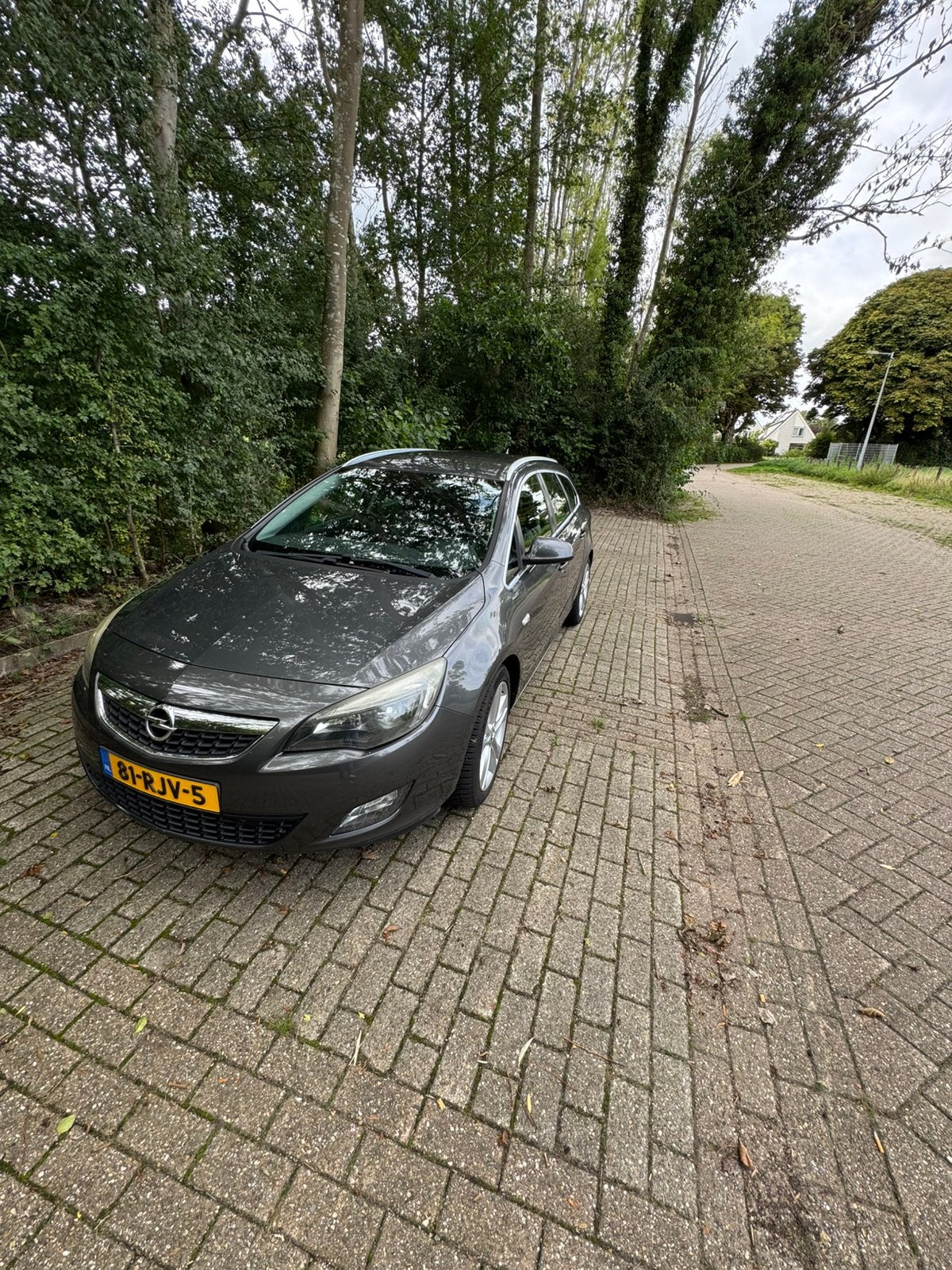 Opel Astra 1.6 Turbo 132KW ST 2011 Grijs, Auto's, Voorwielaandrijving, 730 kg, 4 cilinders, 179 pk
