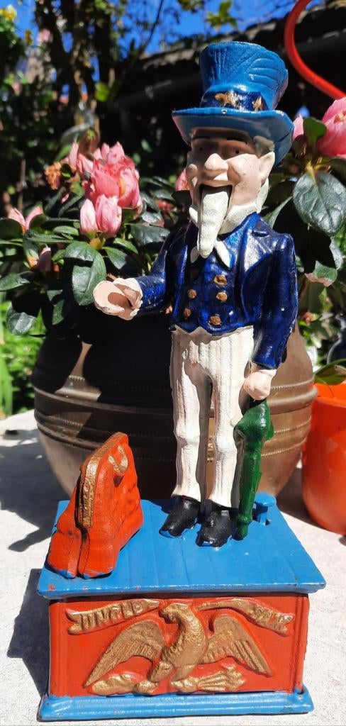 Antieke Mechanische Spaarpot Uncle Sam - Gietijzer, Verzamelen, Spaarpotten, Gebruikt, Overige thema's, Metaal of Blik, Ophalen of Verzenden