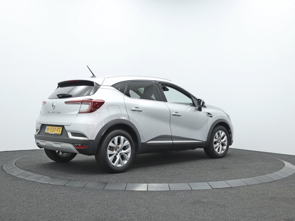 Renault Captur 1.3 TCe Edition | Stoelverwarming | Camera |, Auto's, Gebruikt, 4 cilinders, Leder en Stof, 665 kg