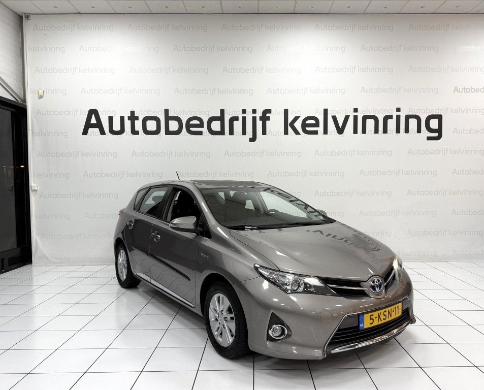 Toyota Auris 1.8 Hybrid Asp Bovag Garantie NAP (bj 2013), Auto's, Automaat, Stof, Gebruikt, 4 cilinders