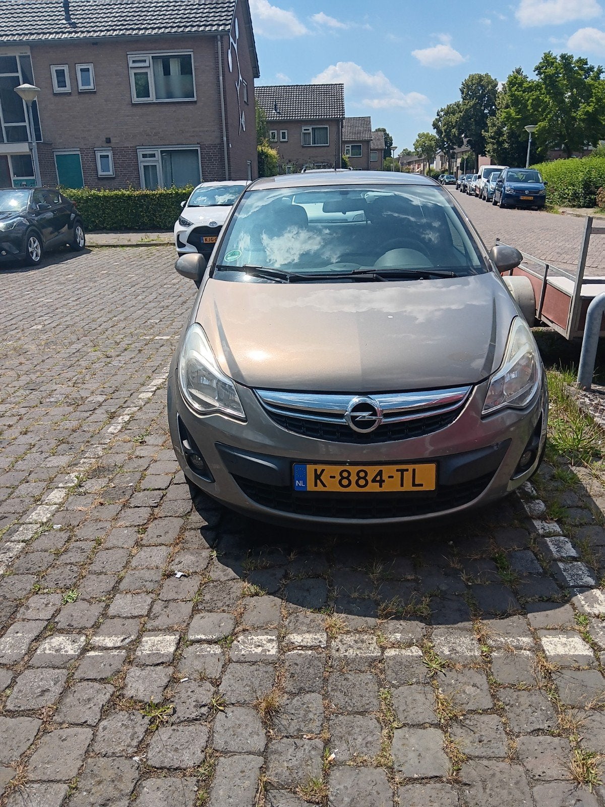 Opel Corsa 1.2 16V Cosmo Anniversary  2012 Bruin APK 03.2027, Auto's, Opel, Particulier, Corsa, Achteruitrijcamera, Airbags, Airconditioning