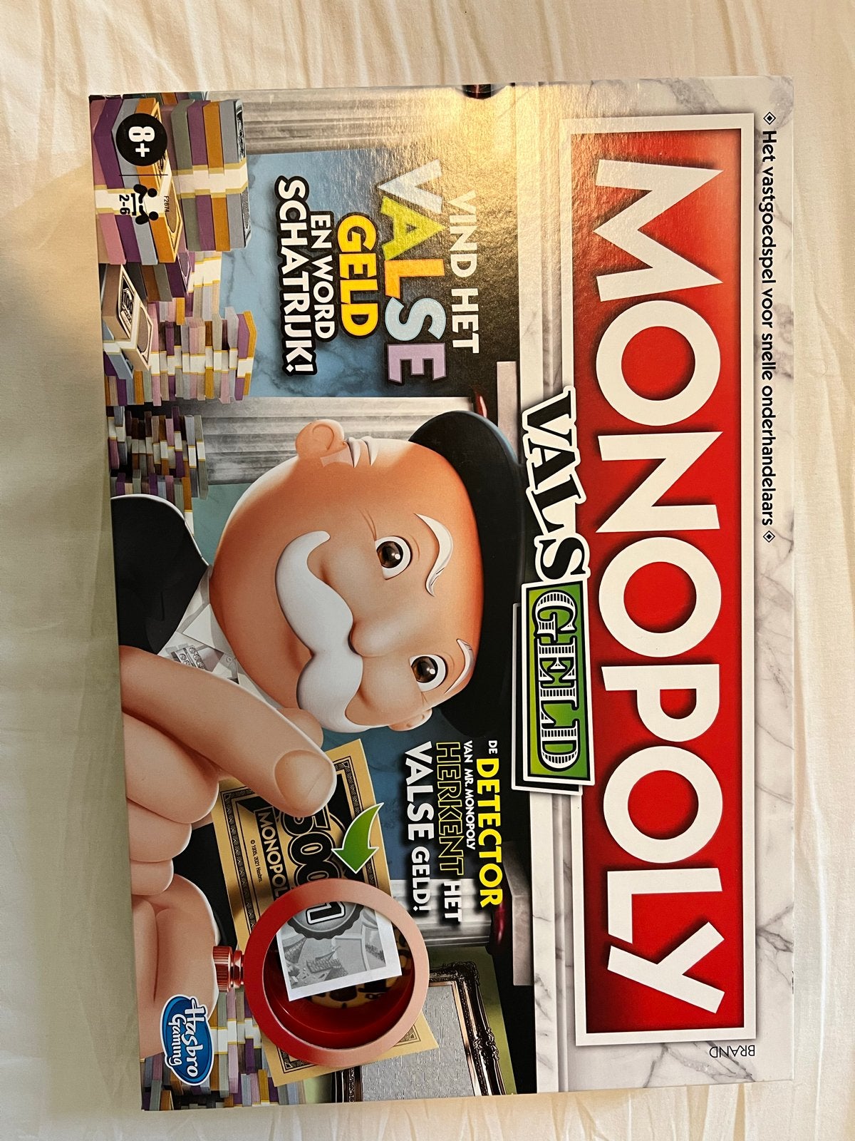 Monopoly Vals Geld - Vind het valse geld en word rijk!, Hobby en Vrije tijd, Gezelschapsspellen | Bordspellen, Drie of vier spelers