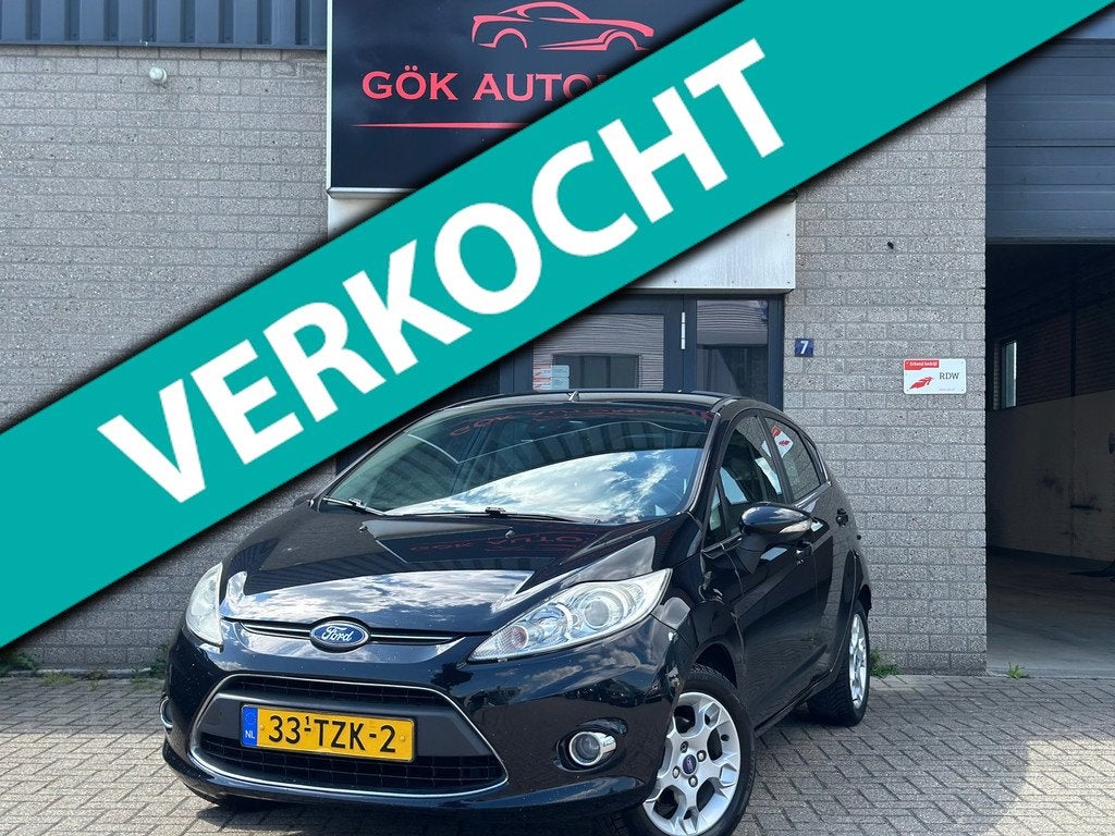 Ford Fiesta 1.25 Titanium / Voorruit Verwarming / NAP / DB R, Voorwielaandrijving, Euro 5, 82 pk, Zwart