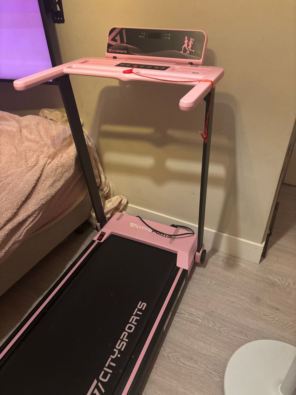 Foto 3 van Zo goed als nieuwe roze loopband - Citysports