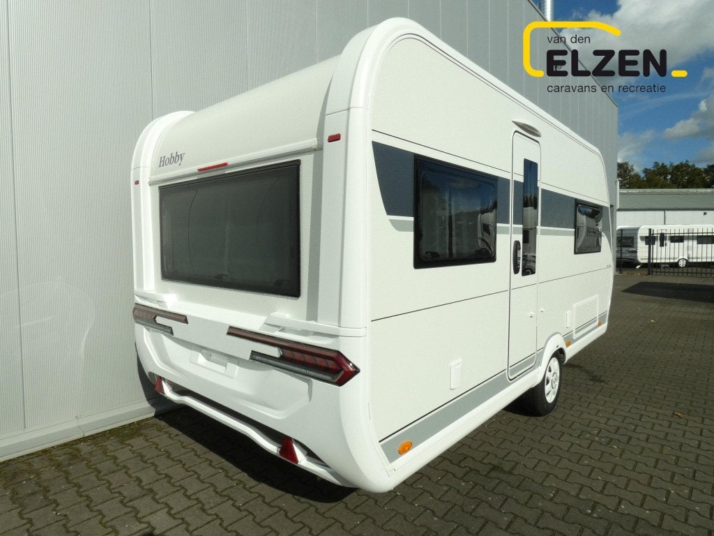 Hobby De Luxe 460 UFE OP=OP AKTIE, Caravans en Kamperen, Schokbreker, Rondzit, Hobby, Bedrijf
