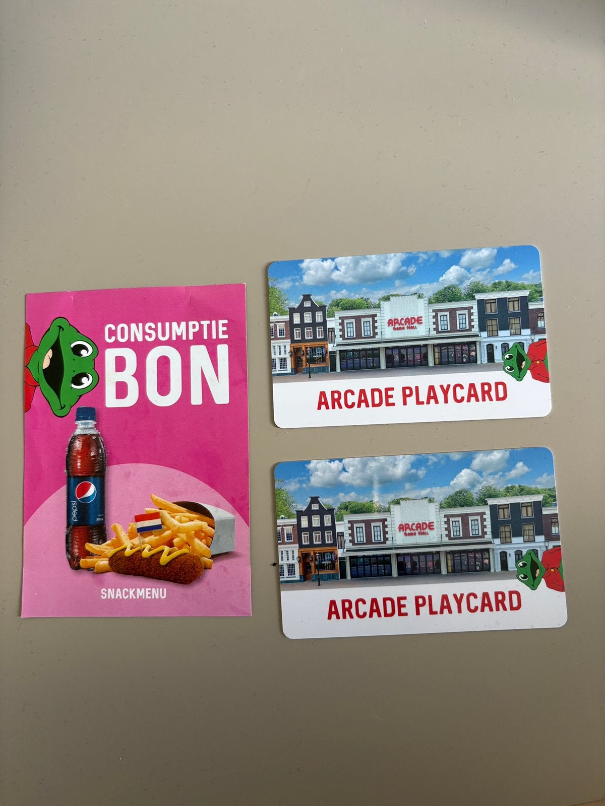 2 arcadepasjes en bon voor snackmenu, Eén persoon