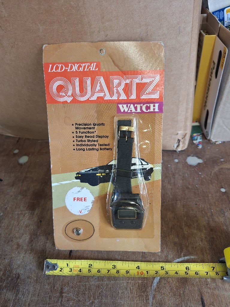 Vintage LCD Digital Quartz Watch in verpakking 1980s, Overige merken, Staal, Polshorloge, 1960 of later