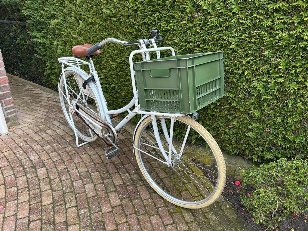 Witte dames stadsfiets Rivel, Ophalen
