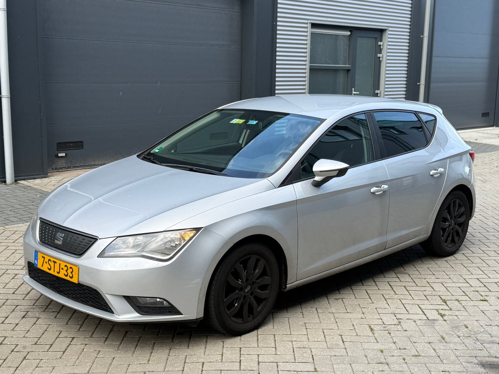 Seat Leon 1.6 TDI 81KW/110PK 2013 Grijs, Auto's, Voorwielaandrijving, 1160 kg, 4 cilinders, Leon