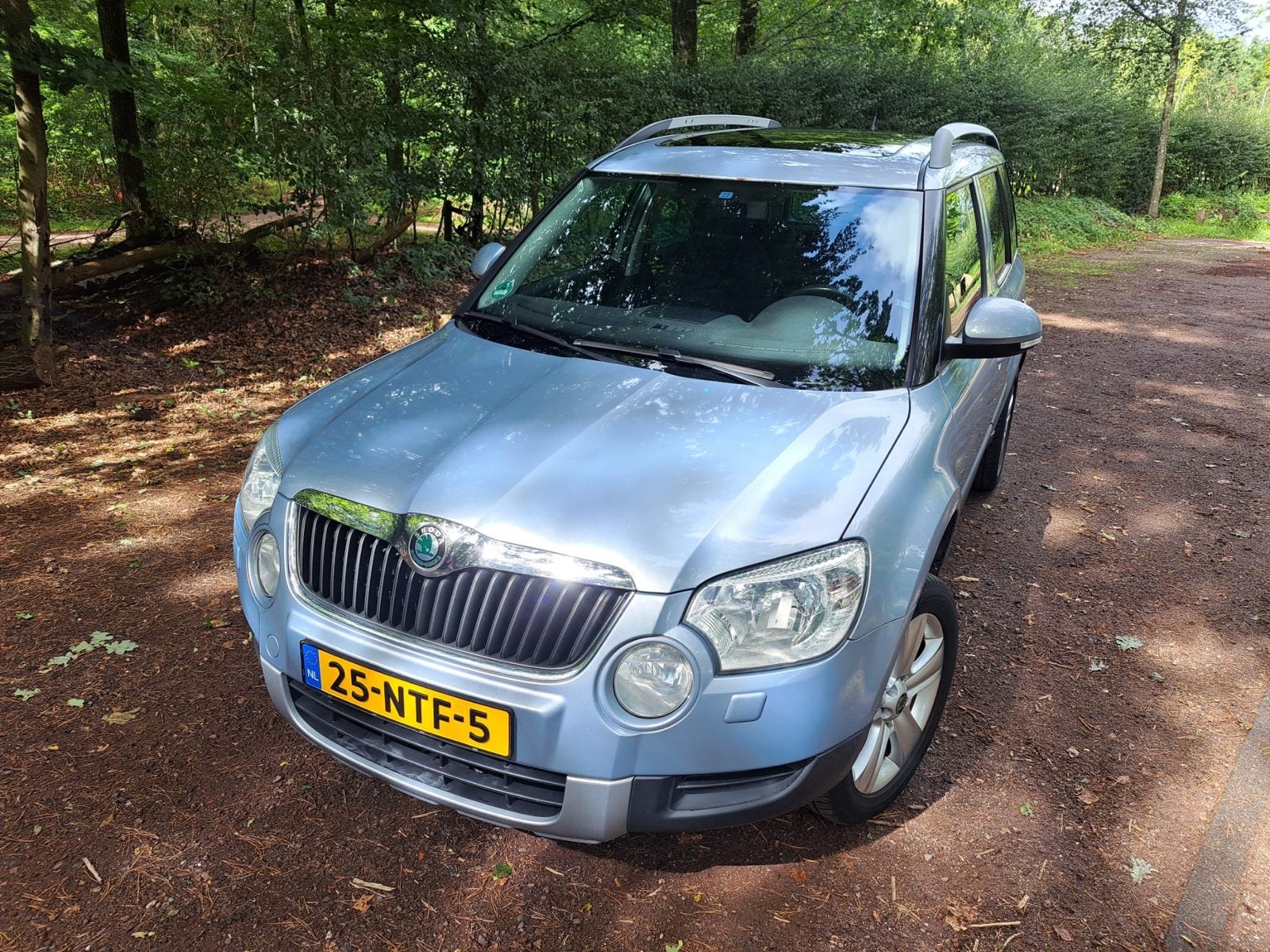 Skoda Yeti 1.2 TSI Elegance 77KW 2010 blauw/grijs metallic, Auto's, Voorwielaandrijving, 4 cilinders, Blauw, Origineel Nederlands
