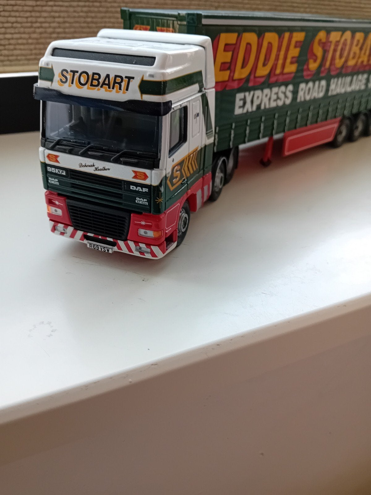 Daf XF SSC 6X2 met schuifzeilentrailer Eddie Stobart., Ophalen of Verzenden, Zo goed als nieuw, Bus of Vrachtwagen, Corgi
