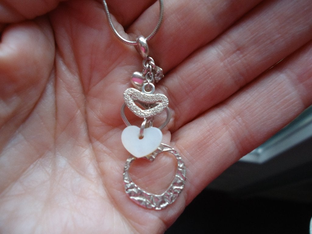 mooie echt zilveren hanger fossil aan slang kettinkje 925, Verstelbaar, Ophalen of Verzenden, Zo goed als nieuw, Zilver
