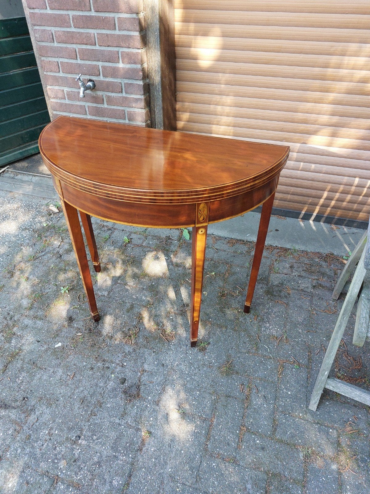 Speeltafel antiek, Ophalen