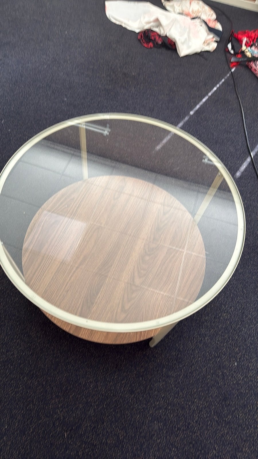 Ovale salontafel met glazen blad en houten onderstel, Ophalen, Gebruikt, 100 tot 150 cm, 50 tot 100 cm