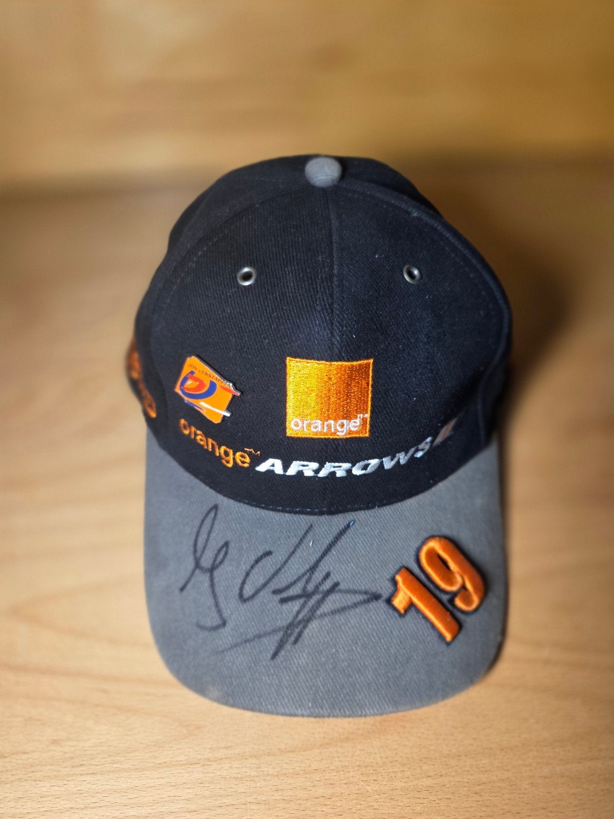 Gesigneerde Jos Verstappen Orange Arrows F1 pet, Ophalen of Verzenden, Zo goed als nieuw