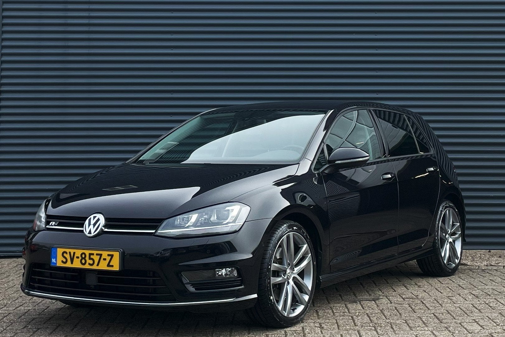 Volkswagen Golf 1.4 TSI 140PK R-Line DSG, Gebruikt, 4 cilinders, Leder en Stof, Zwart
