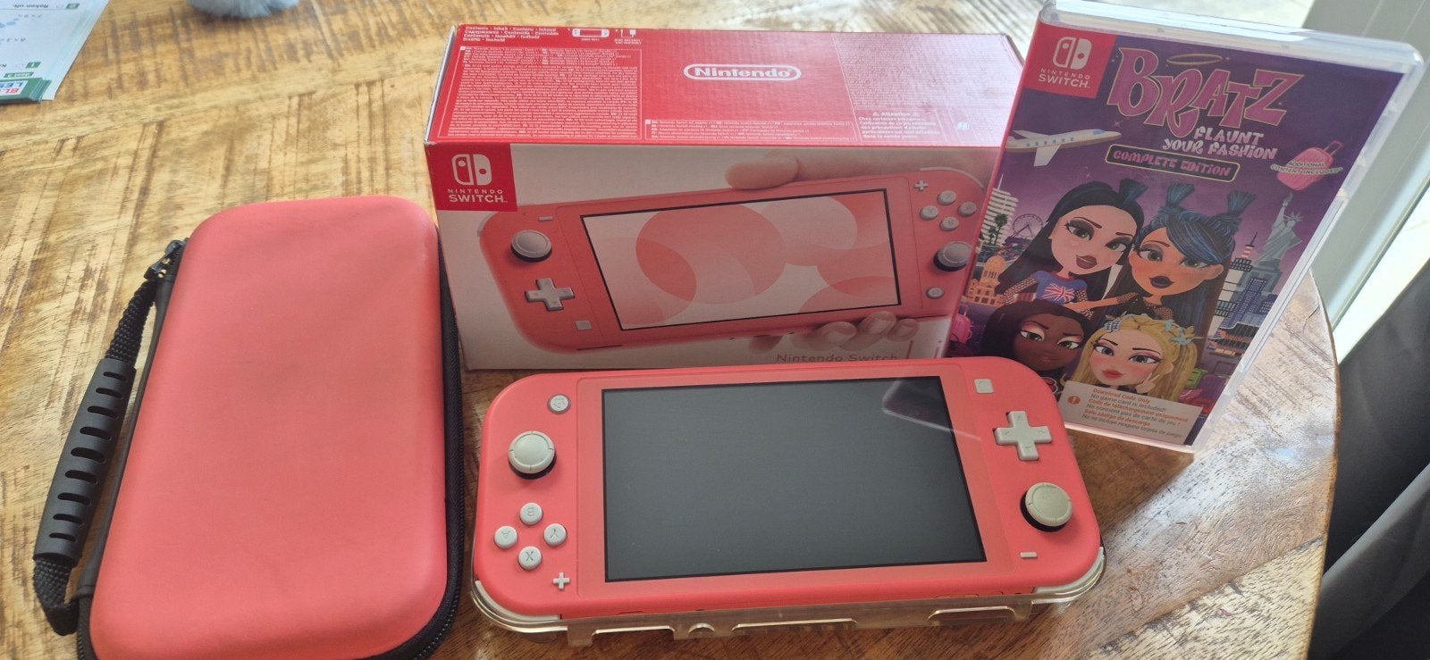 Zo goed als nieuwe Nintendo Switch Lite Roze (2024), Spelcomputers en Games, Spelcomputers | Nintendo Switch Lite, Ophalen of Verzenden