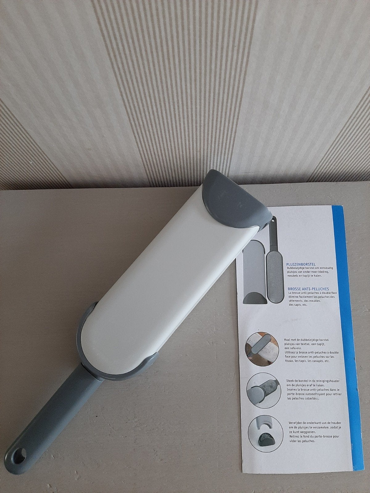 Ongebruikte dubbelzijdige pluizenborstel Wats home., Ophalen of Verzenden, Overige typen