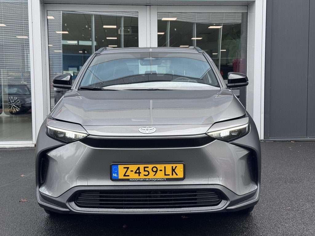 Toyota bZ4X Active 71 kWh 17% BIJTELLING | Navigatie | Parke, Auto's, Toyota, Stof, Gebruikt, 71 kWh, Origineel Nederlands