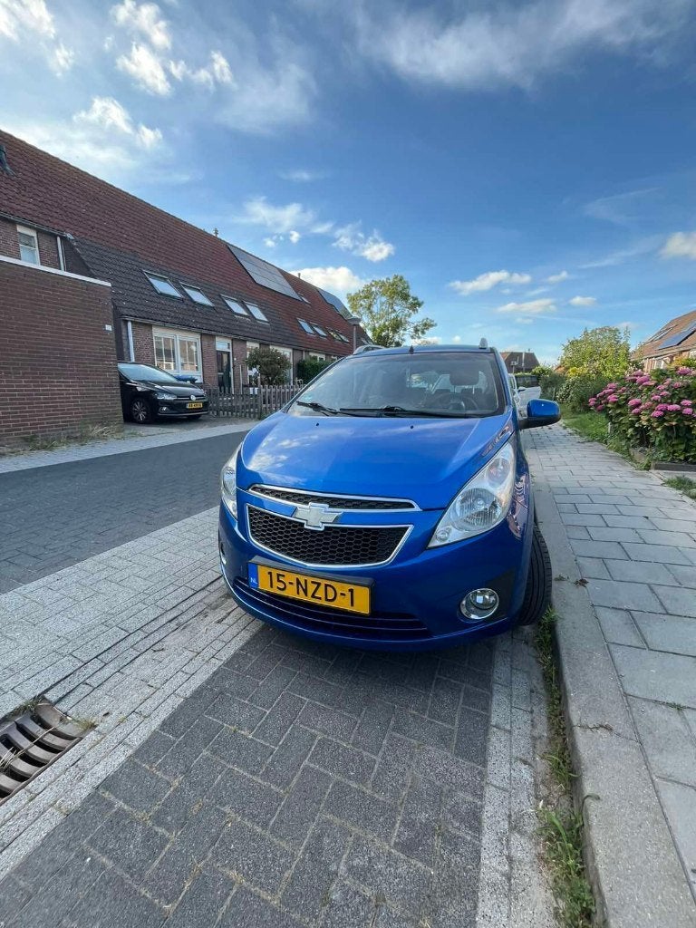Chevrolet Spark 1.0 Bifuel 2011 Blauw, Auto's, Voorwielaandrijving, Euro 5, 15 km/l, 37 €/maand