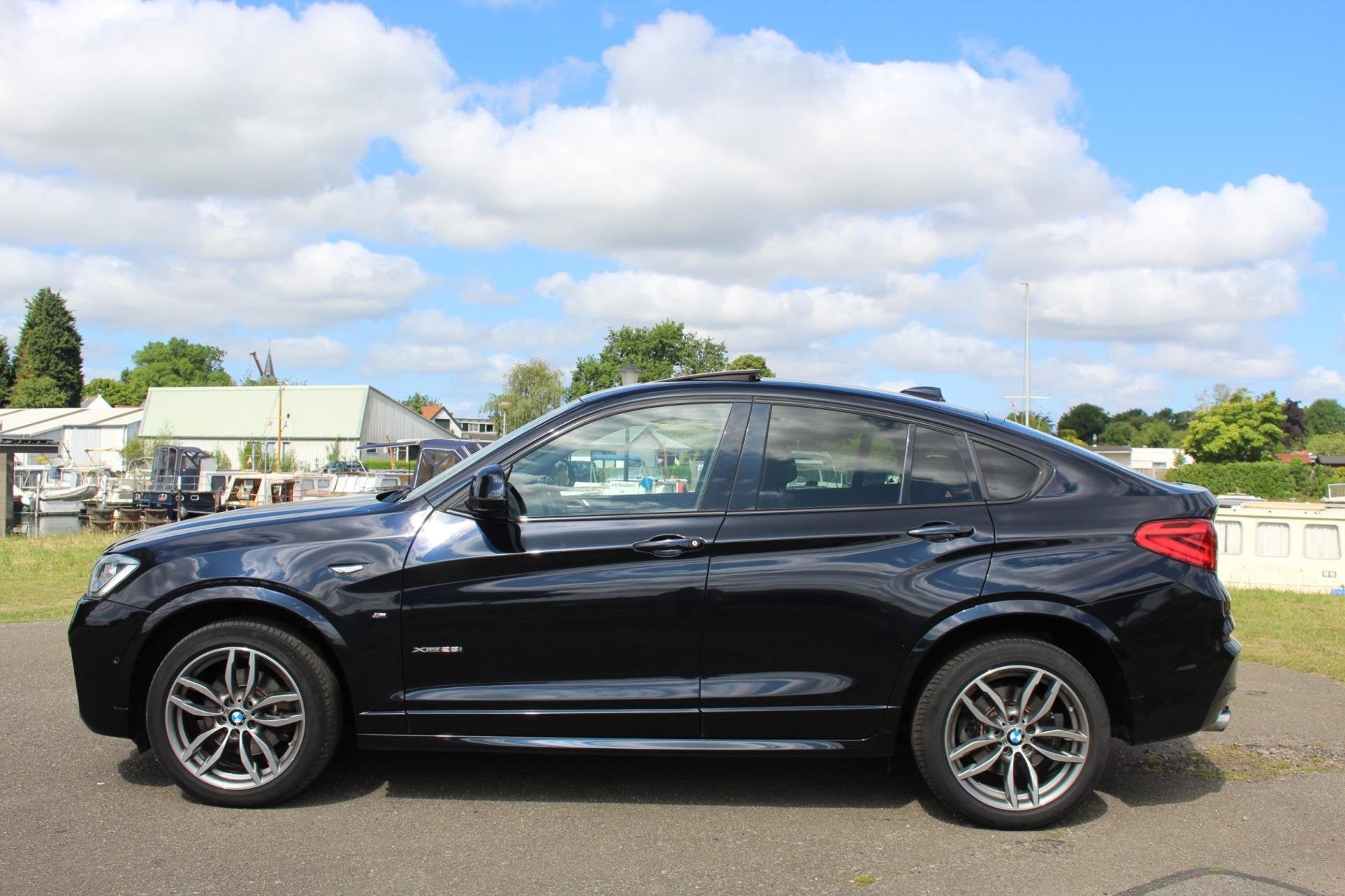 BMW X4 XDrive28i Centennial High Executive *245PK *Pano *Cam, Automaat, Dealer onderhouden, Lichtsensor, Gebruikt