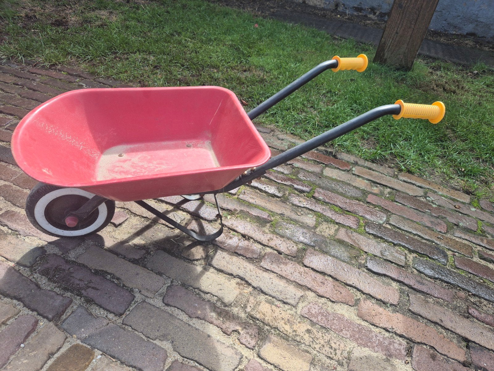 kinder kruiwagen, Ophalen