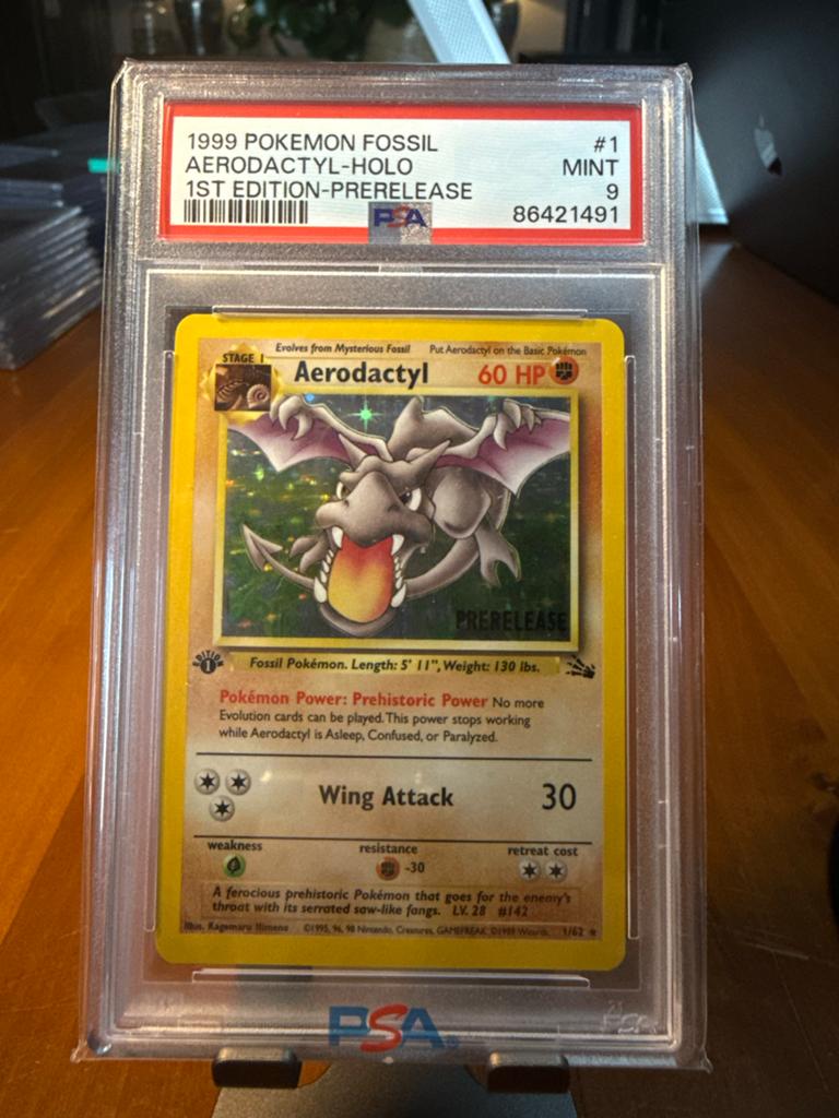 Aerodactyl 1st Ed. (Prerelease ) #1 - Fossil (1999) - PSA 9, Ophalen of Verzenden, Zo goed als nieuw, Losse kaart, Foil