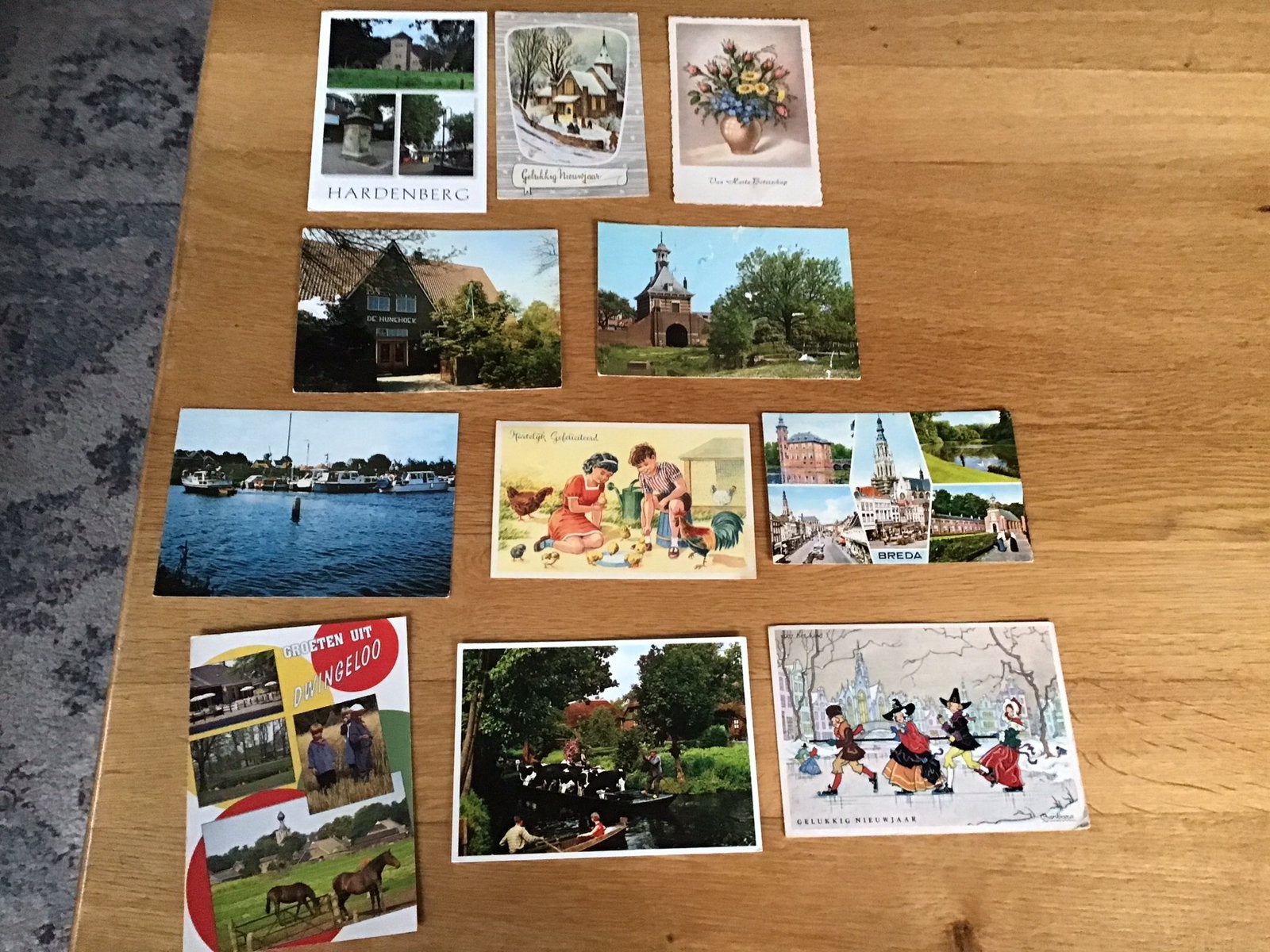 11 Oude Ansichtkaarten,stads/dorpsgezichten,nieuwjaar,kinder, Ophalen of Verzenden, Gelopen, Overige thema's
