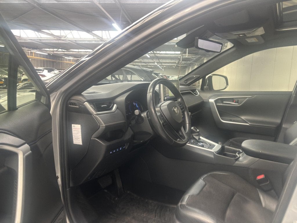 Toyota RAV4 2.5 Hybrid AWD Bi-Tone, Auto's, Toyota, Automaat, Gebruikt, Euro 6, 4 cilinders