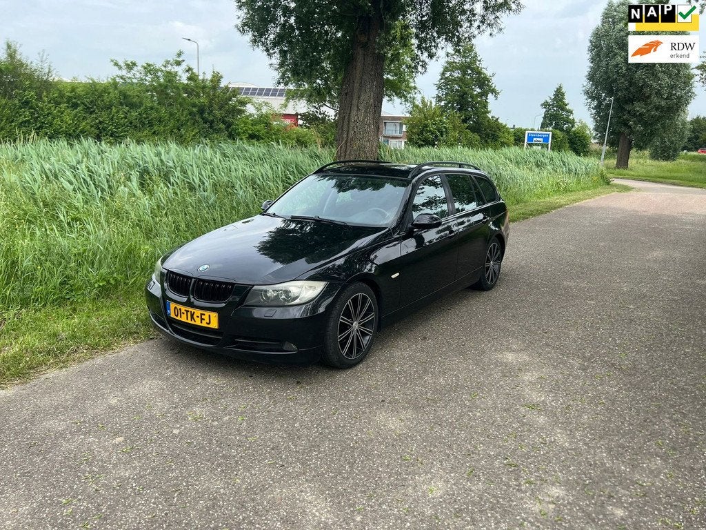 BMW 3-serie Touring 320i High Executive Automaat Airco Cruis, Auto's, Automaat, Parkeersensor, Zwart, 4 cilinders