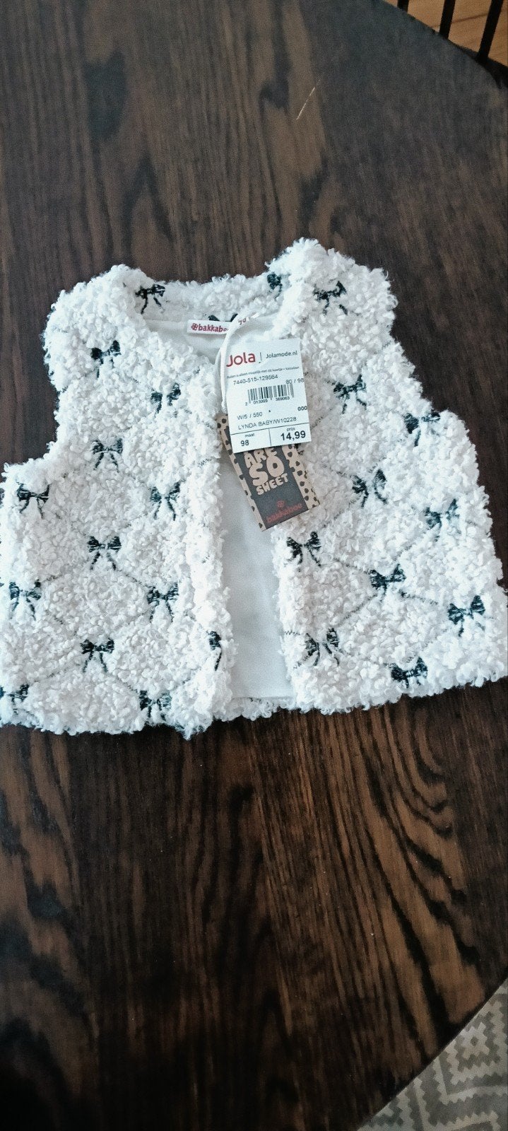 vestje bodywarmer fluffy strikjes maat 97 Jola mode, Kinderen en Baby's, Ophalen of Verzenden, Nieuw, Jola mode, Meisje